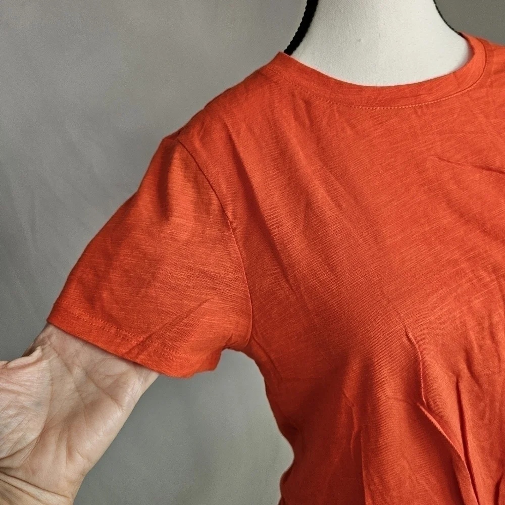 NWT ORANGE TOP SIZE MEDIUM